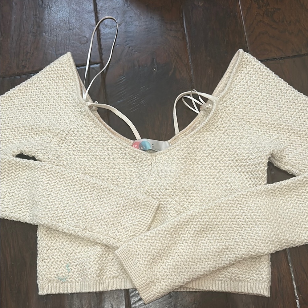 Free People Cream Off-the-Shoulder Sweater with Long Sleeves and Cropped Style